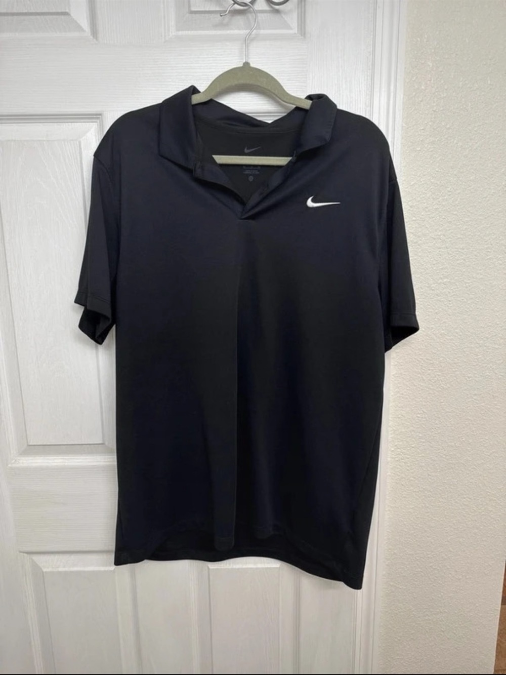 Nike Men’s Black Polo with White Swoosh